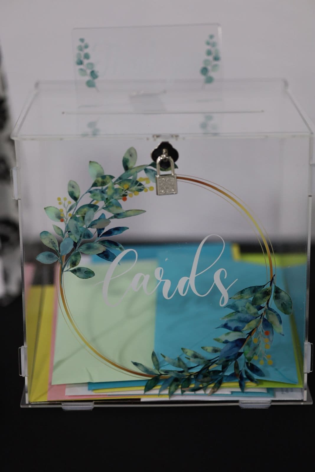 Custom acrylic card box with floral detailing