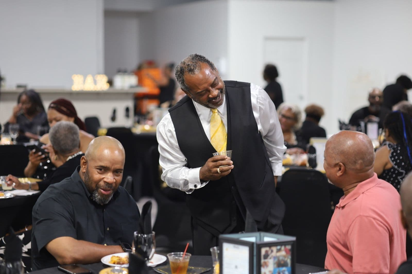 Guests connecting over drinks during the reception